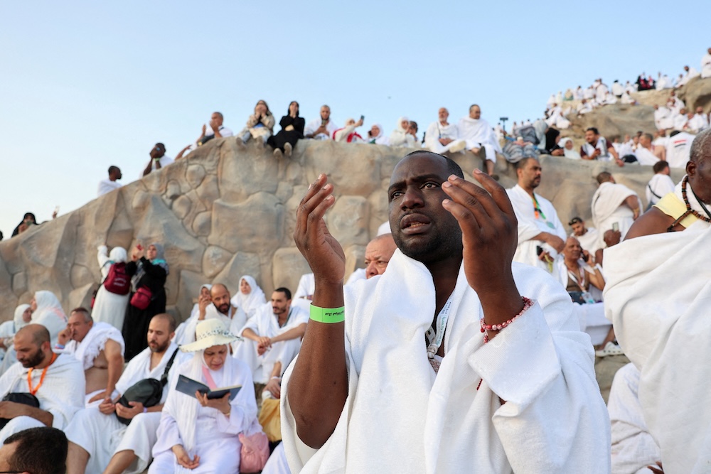 Pilgrims gather at Mount Arafat to offer prayers during the annual Hajj pilgrimage on June 5, 2025. (Reuters)