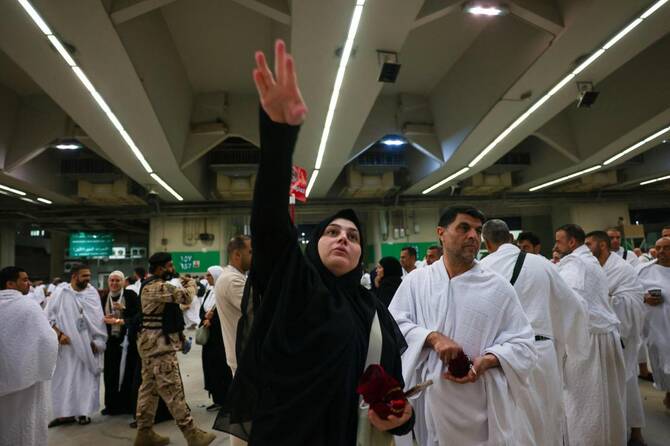 Muslim pilgrims perform the symbolic ‘stoning of the devil’ ritual as part of the hajj pilgrimage in Mina on June 6, 2025. (AFP)