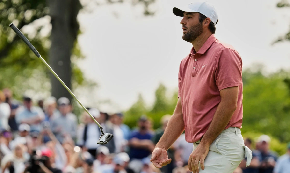 Scottie Scheffler tosses his club after missing a putt on the ninth green during the third round of the Memorial golf tournament Saturday, May 31, 2025, in Dublin, Ohio. (AP)