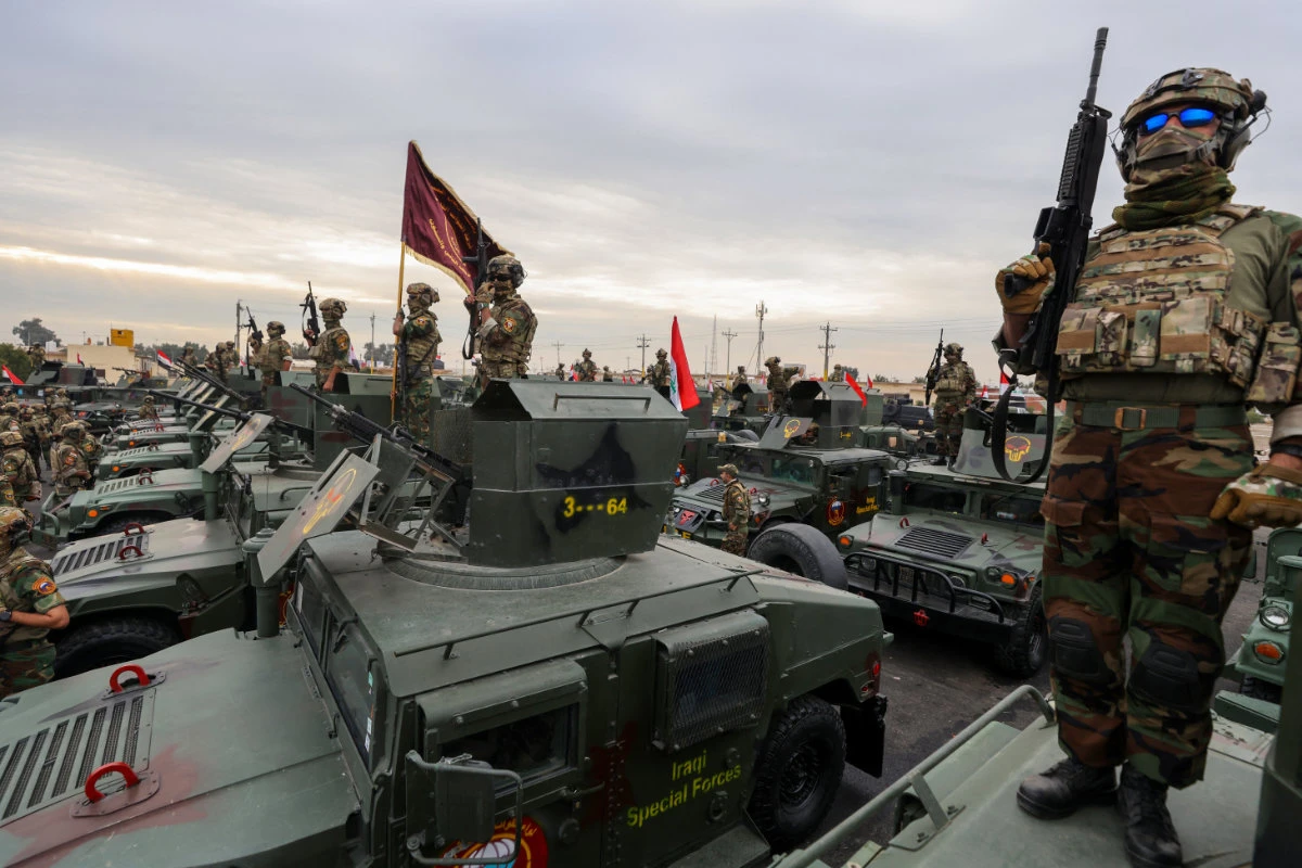 An Iraqi Special Forces unit participate in Army Day celebrations at the Camp Taji military base north Baghdad, on January 6, 2025. (AFP/File)