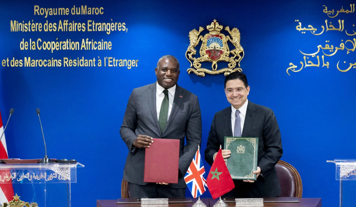 Britain's Foreign Secretary David Lammy (L) and his moroccan counterpart Nasser Bourita sign agreements in Rabat on June 1, 2025. (AFP)