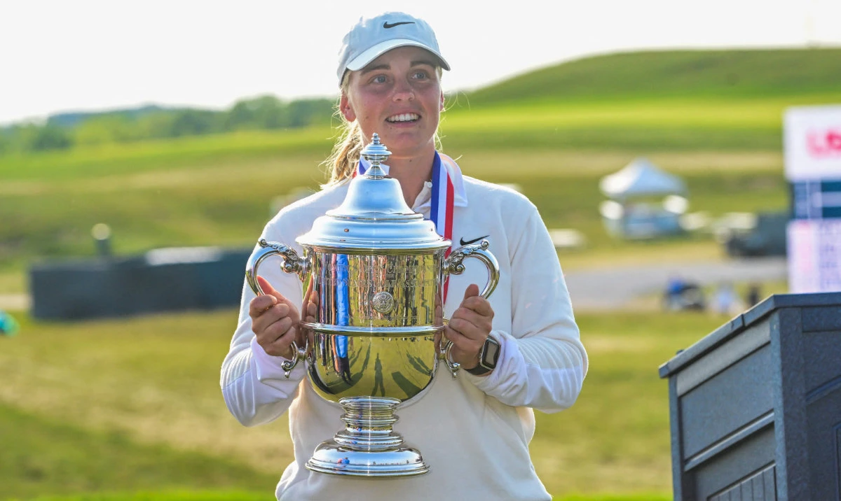Maja Stark holds up her championship trophy after winning the US Women’s Open golf tournament. (Reuters)