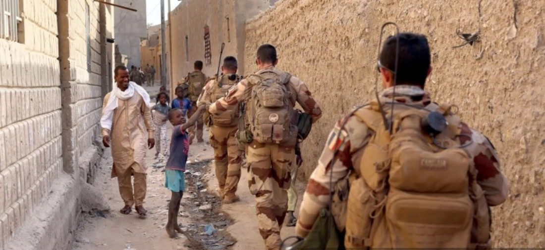 French soldiers of the Barkhane force patrol the streets of Timbuktu, northern Mali. (AFP)