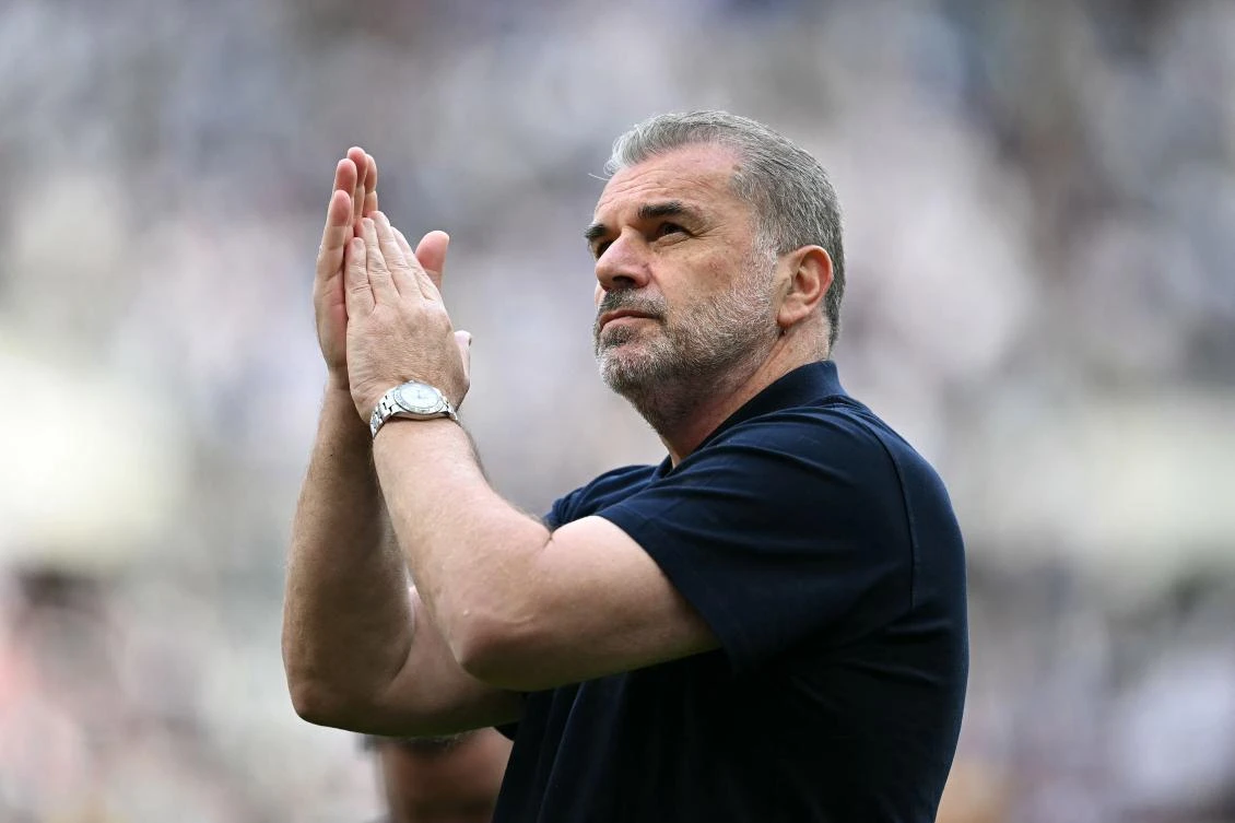 Tottenham Hotspur’s Greek-Australian Head Coach Ange Postecoglou applauds the fans following their EPL match against Brighton and Hove Albion at the Tottenham Hotspur Stadium in London, on May 25, 2025. (AFP)