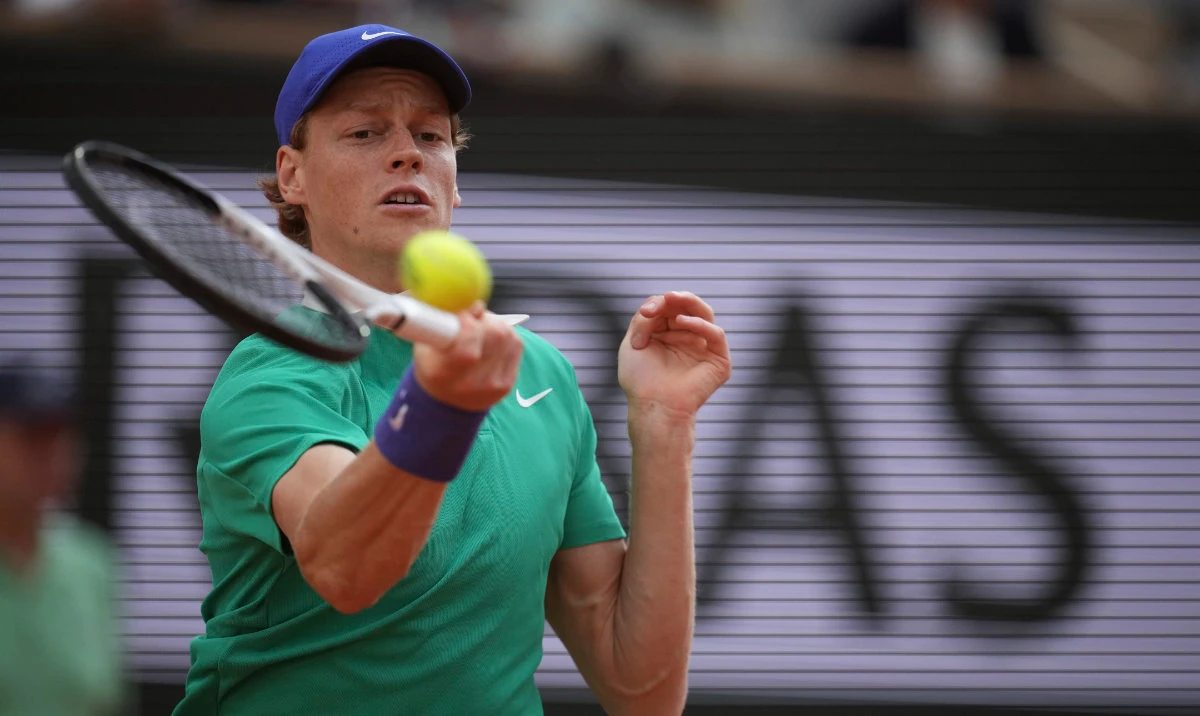 Italy's Jannik Sinner plays a shot against Serbia's Novak Djokovic during their semifinal match of the French Tennis Open at the Roland-Garros stadium in Paris, Friday, June 6, 2025. (AP)