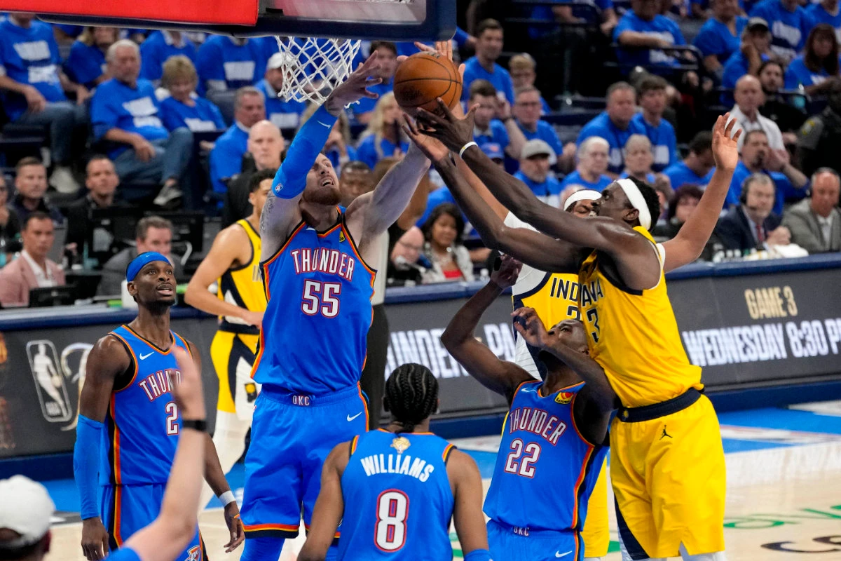 Oklahoma City Thunder center Isaiah Hartenstein (55) and Indiana Pacers center Myles Turner (33) and forward Pascal Siakam (43) battle for the rebound during the third quarter of game two of the 2025 NBA Finals at Paycom Center in Oklahoma City on June 8, 2025. (Kyle Terada-Imagn Images)