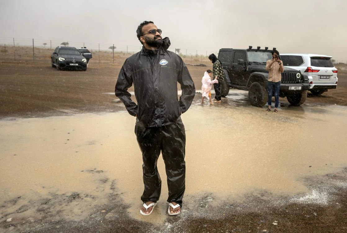 Monsoon-loving Indian expats chase rain in UAE desert