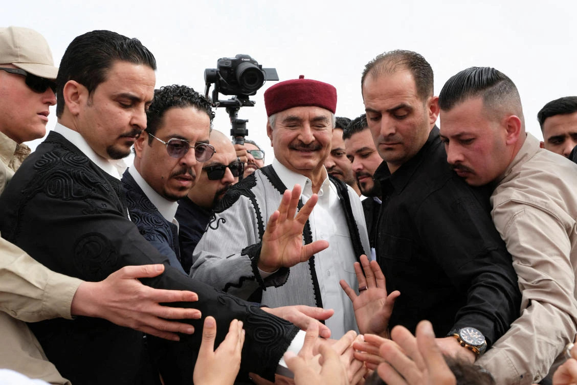FILE PHOTO: Libyan military commander Khalifa Haftar attends a carnival to celebrate Eid El Fitr in a public square in Benghazi, Libya April 21, 2023. REUTERS/Esam Omran Al-Fetori/File Photo