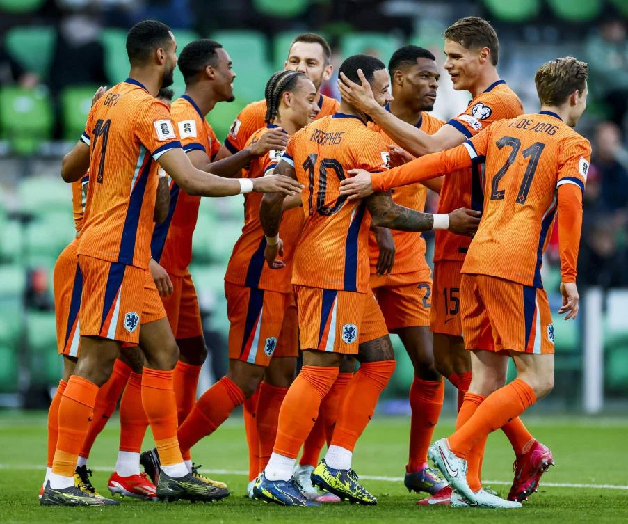 Depay scored twice inside the opening 16 minutes of the Netherlands’ 8-0 win over Malta in a World Cup qualifier to equal Robin van Persie’s record of 50. (AFP)