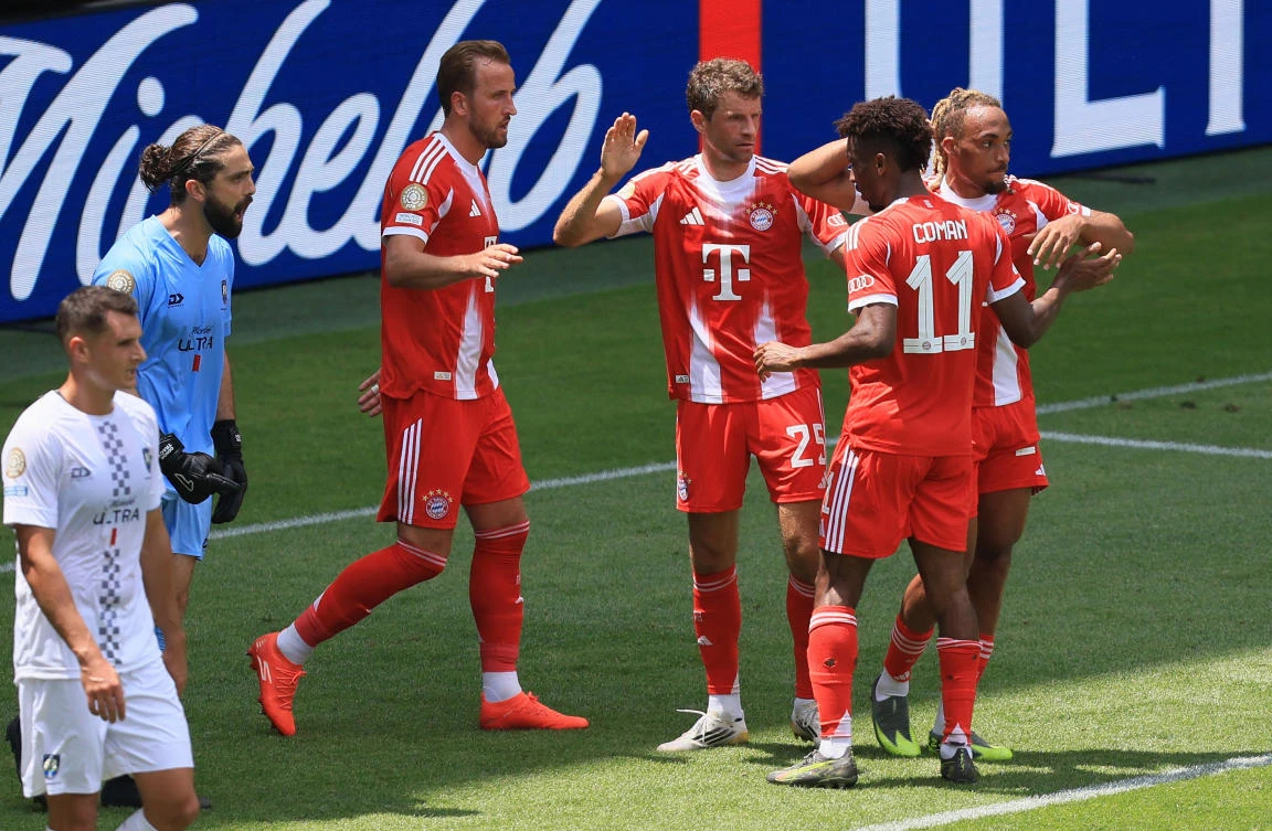 Bayern Munich’s Thomas Mueller celebrates scoring their fifth goal with Harry Kane, Kingsley Coman and Sacha Boey. (IMAGN IMAGES via Reuters)