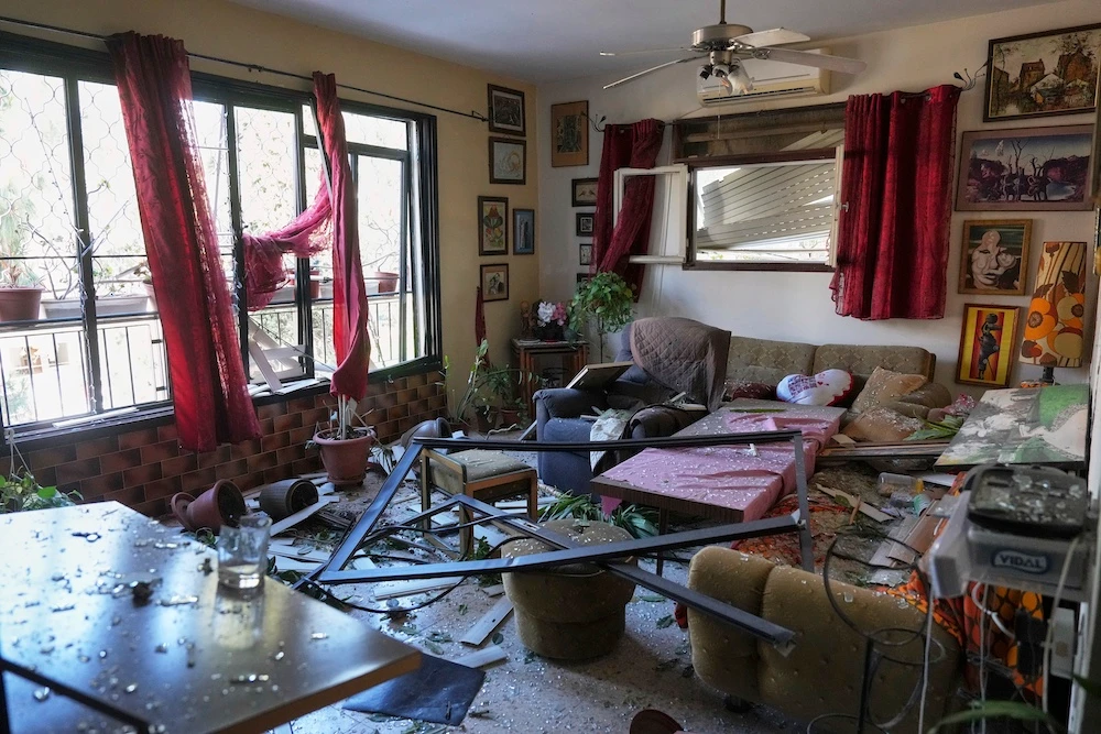 A damaged apartment is seen near the site where an Iranian missile struck in Haifa, Israel, Monday, June 16, 2025. (AP)