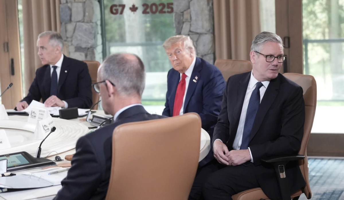 Britain's Prime Minister Keir Starmer, right, and US President Donald Trump, second right, during the first working session at the G7 summit in Kananaskis, Alberta, Canada, Monday June 16, 2025. (AP)