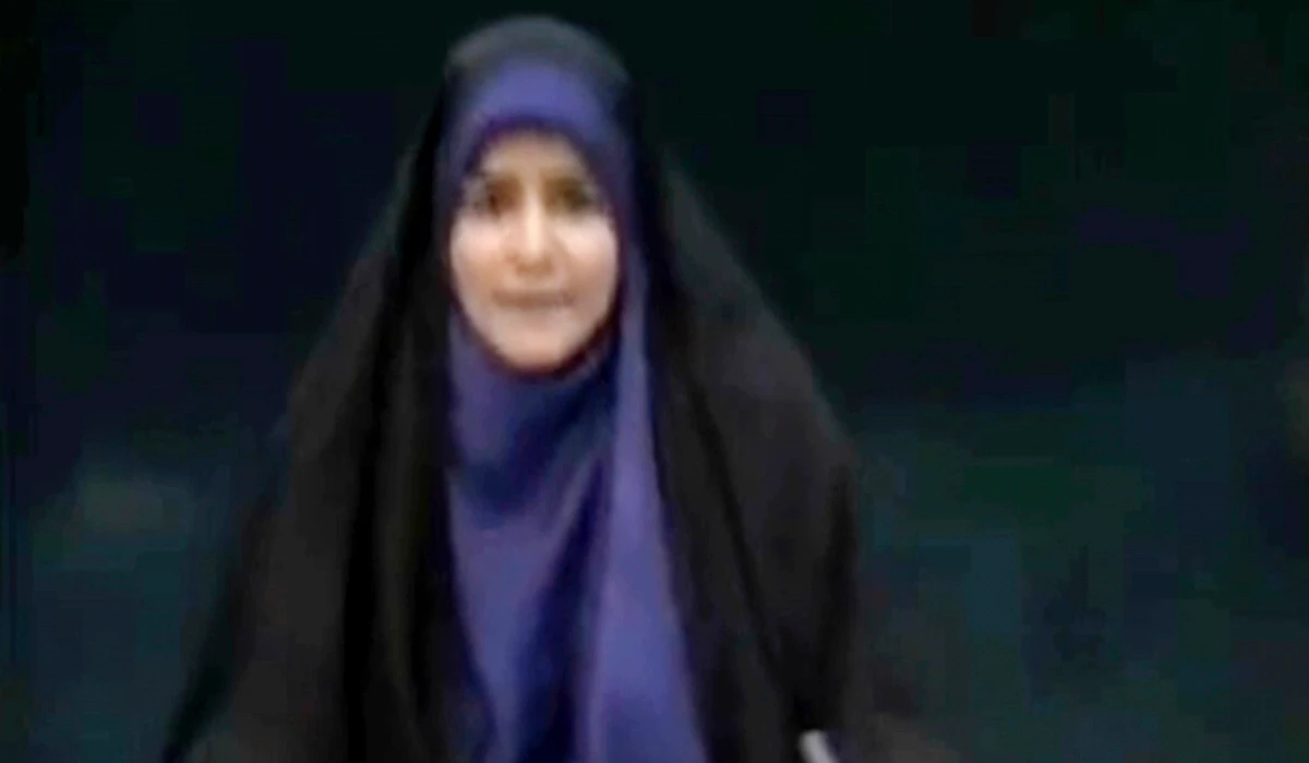 This frame grab from a video released by Iran state TV shows anchor Sahar Emami amid an explosion from an Israeli attack during a live TV broadcast, June 16, 2025, in Tehran, Iran. (AP)