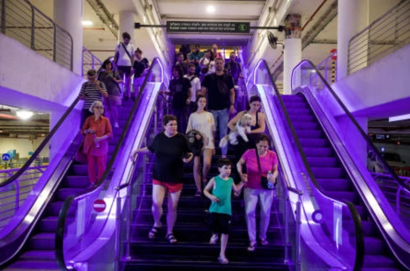 People go to public shelter following missile attack from Iran on Israel, at Tel Aviv, Israel Jun. 13, 2025 (Reuters)