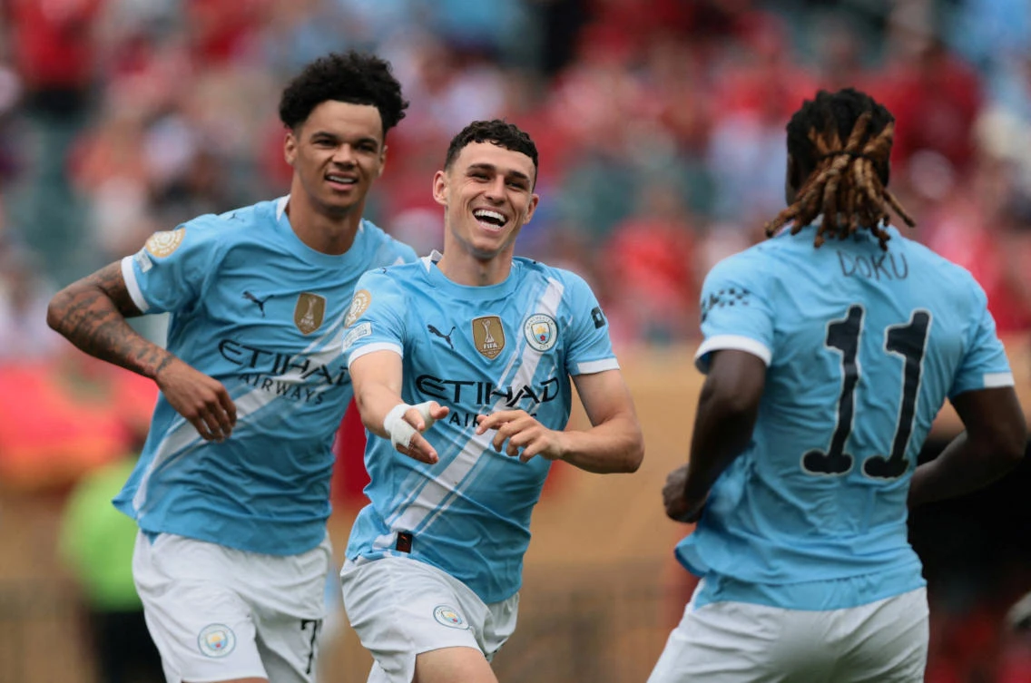 Manchester City’s Phil Foden celebrates scoring their first goal with Nico O’Reilly and Jeremy Doku during their FIFA Club World Cup — Group G — match against Wydad Casablanca — Lincoln Financial Field, Philadelphia, on Jun. 18, 2025. (Reuters)