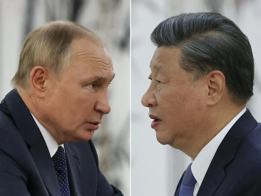 Russian President Vladimir Putin and Chinese President Xi Jinping held a phone call on Thursday during which both leaders agreed de-escalation was needed on the Iran-Israel war. (Sputnik/AFP)