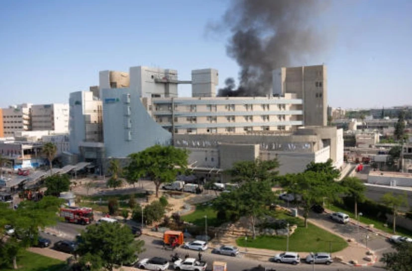 Smoke billows from a building at Soroka Hospital in Beersheba in southern Israel following an Iranian missile attack, on June 19, 2025. (AFP)