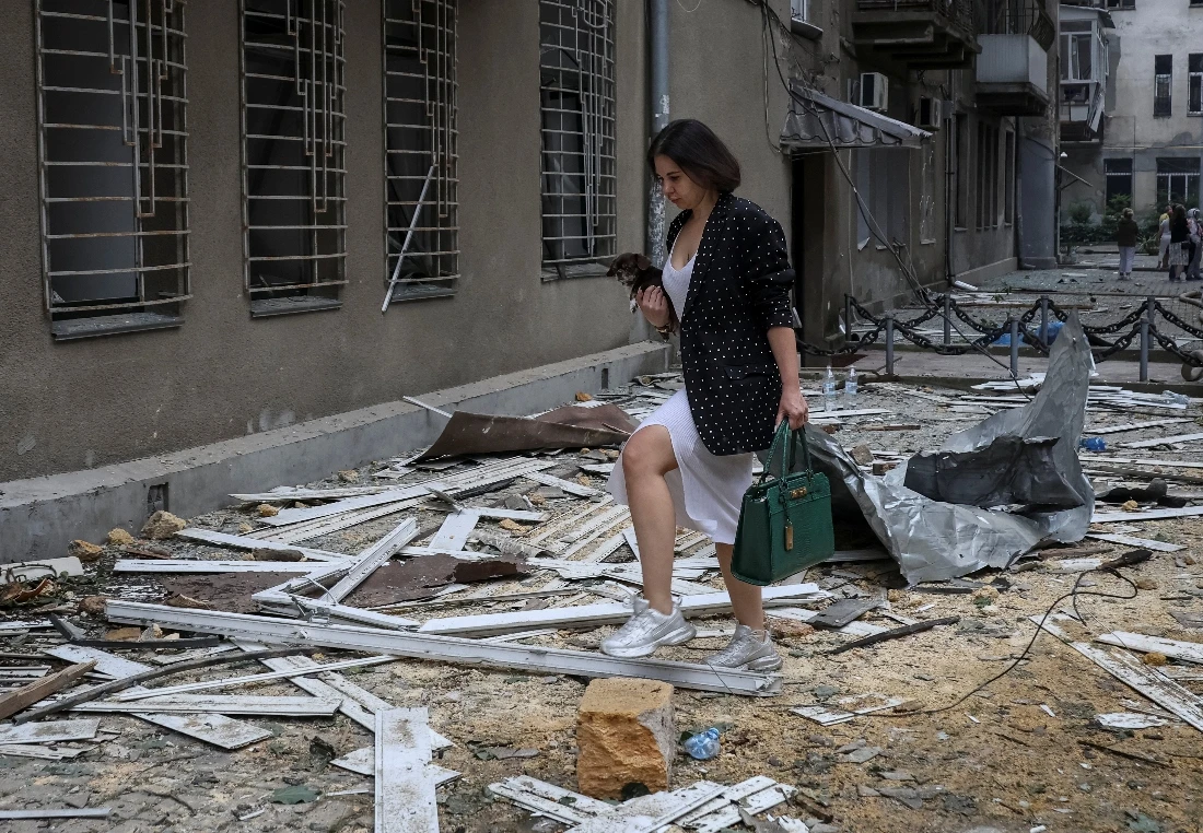 Ukrainian resident walks at the site of a Russian drone strike in Odesa, Ukraine. (Reuters)