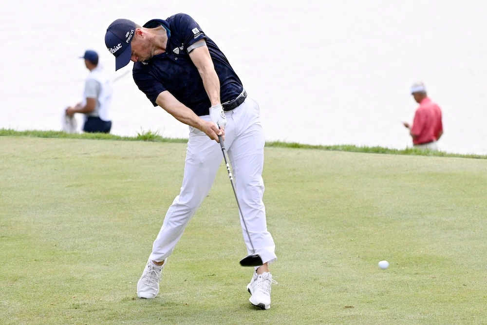 Justin Thomas tees off the 18th hole during the second round of the Travelers Championship golf tournament at TPC River Highlands Friday in Cromwell, Conn. (AP)