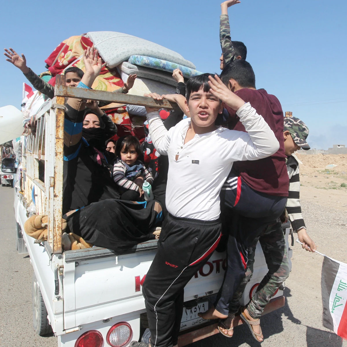 Refugees return back to Al-Alam town, northeast of the Iraqi city of Tikrit, after the town was recaptured from Daesh in 2015. (AFP/File)