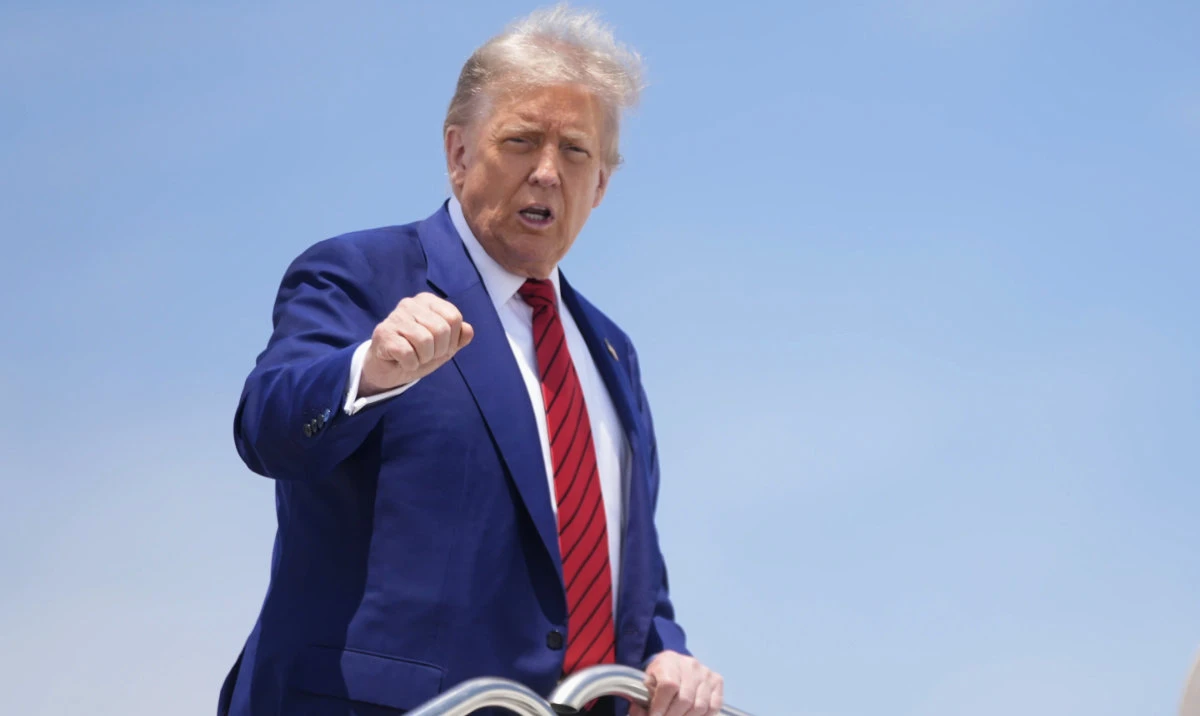 President Donald Trump gestures as he boards Air Force One at Joint Base Andrews, Md., June 20, 2025. (AP)