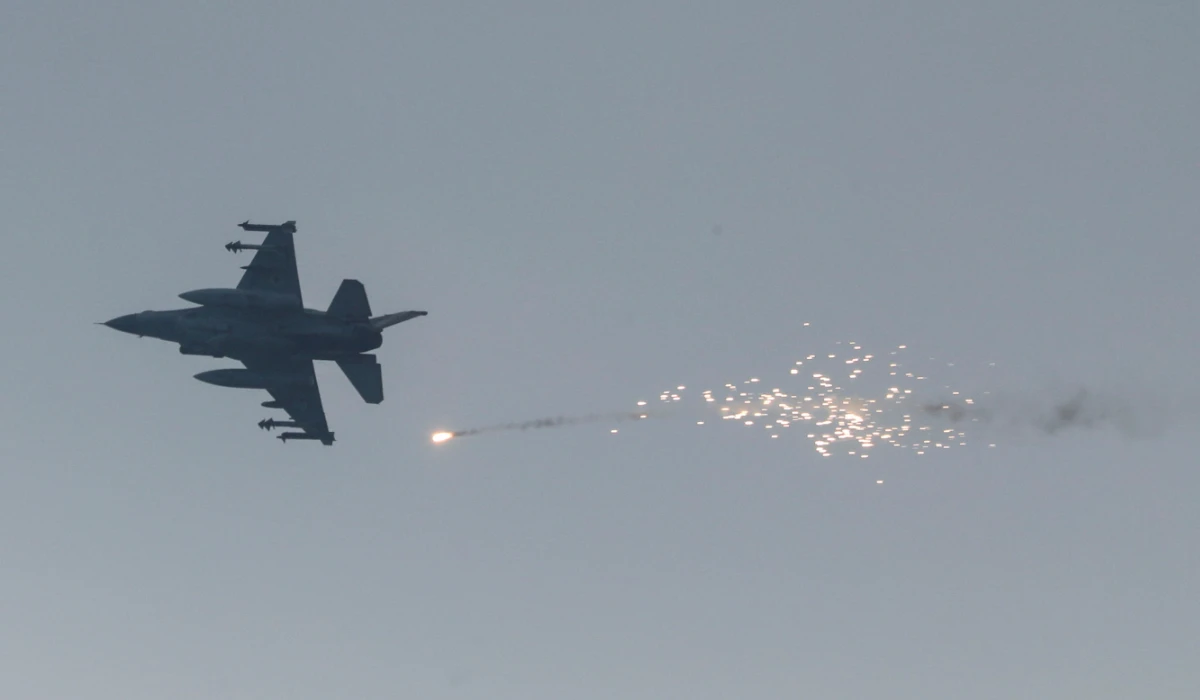 An Israeli aircraft fires a flare, in Gaza City, June 22, 2025. (REUTERS)