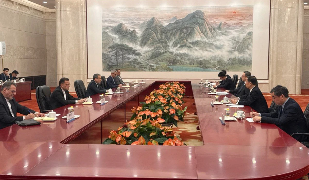 This handout picture provided by the Iranian foreign ministry shows Chinese Vice Premier Ding Xuexiang (3rd-R) meeting with Iran's Foreign Minister Abbas Araghchi (3rd-R) in Beijing on April 23, 2025. (AFP)
