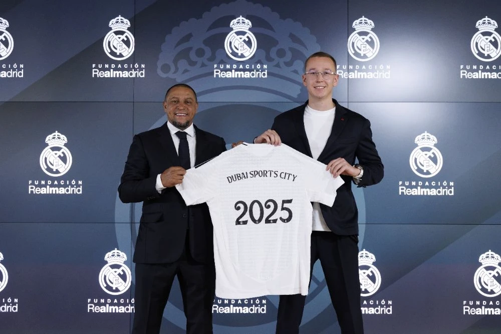Daniels Petrovs, CEO of ISD Sports City, and Real Madrid Ambassador Roberto Carlos. (Supplied)