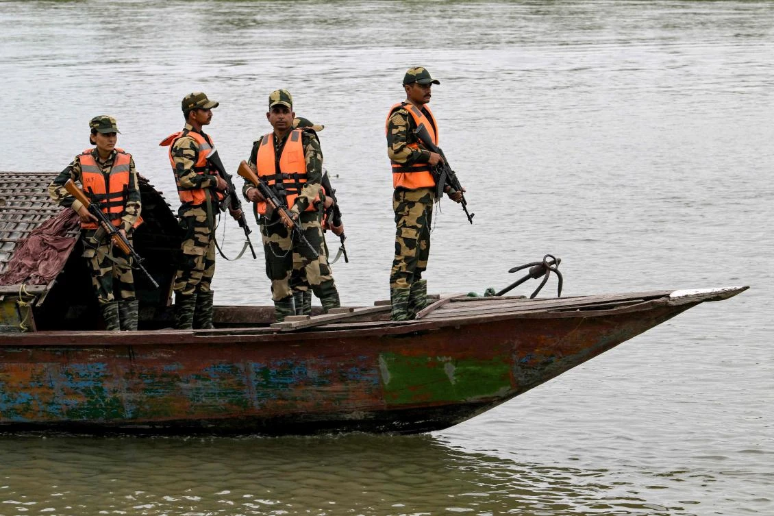 Above, Border Security Force personnel patrol along the Gangadhar river near the India-Bangladesh border in Golakganj, Dhubri district in India’s Assam State on May 26, 2025. (AFP)