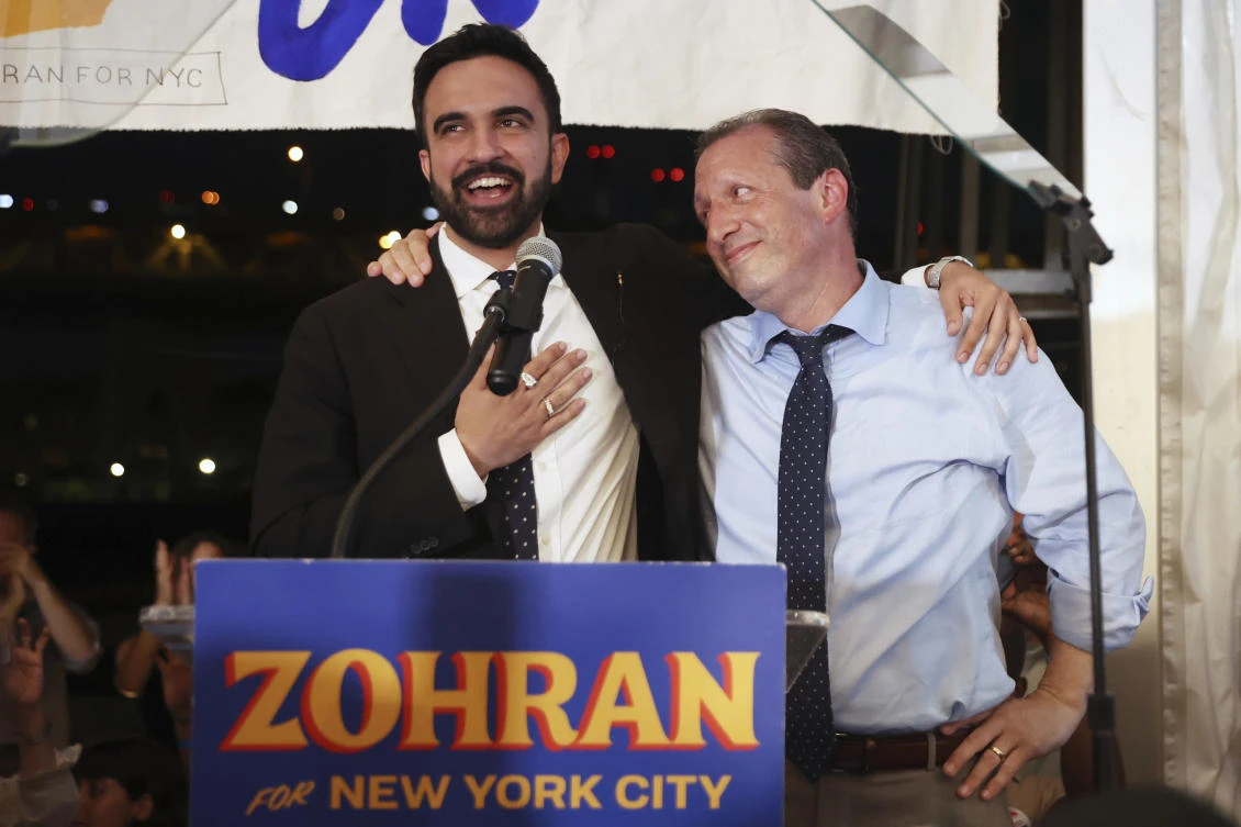 Democratic mayoral candidate Zohran Mamdani, left, speaks on stage with fellow candidate Comptroller Brad Lander at his primary election party, Jun. 25, 2025, in New York. (AP)