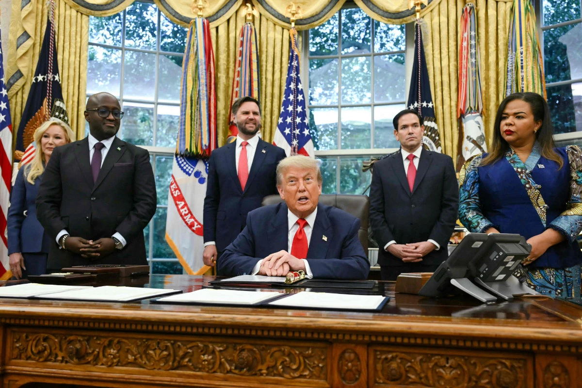 US President Donald Trump speaks during a meeting with DR Congo's Foreign Minister Thérèse Kayikwamba Wagner (R) and Rwandan FM Olivier Nduhungirehe (2nd-L) at the White House in Washington, DC, on June 27, 2025. (AFP)