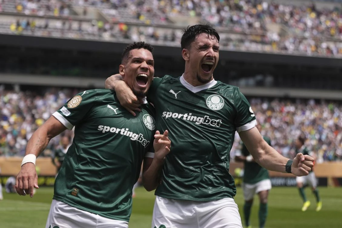 Palmeiras’ Paulinho, left and Joaquin Piquerezd celebrate during their Club World Cup round of 16 match against Botafogo in Philadelphia, Jun. 28, 2025. (AP)