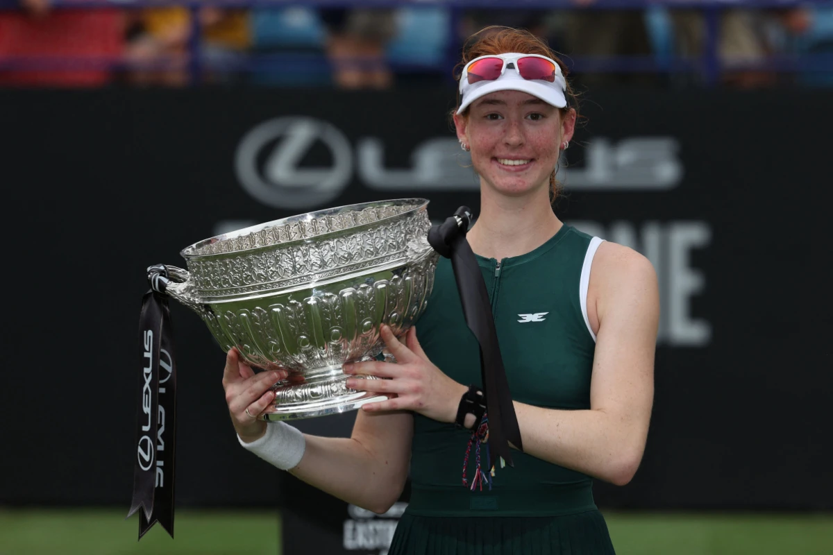 Australia's Maya Joint poses with the trophy after beating Philippines' Alexandra Eala in their women's singles final tennis match on day six of the Lexus Eastbourne International tennis tournament in Eastbourne, England, on June 28, 2025. (AFP)