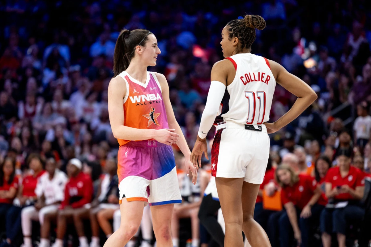 Caitlin Clark #22 of Team WNBA talks to Napheesa Collier #11 of the USA Women's National Team during the 2024 WNBA All Star Game at Footprint Center on July 20, 2024 in Phoenix, Arizona. (AFP/File)