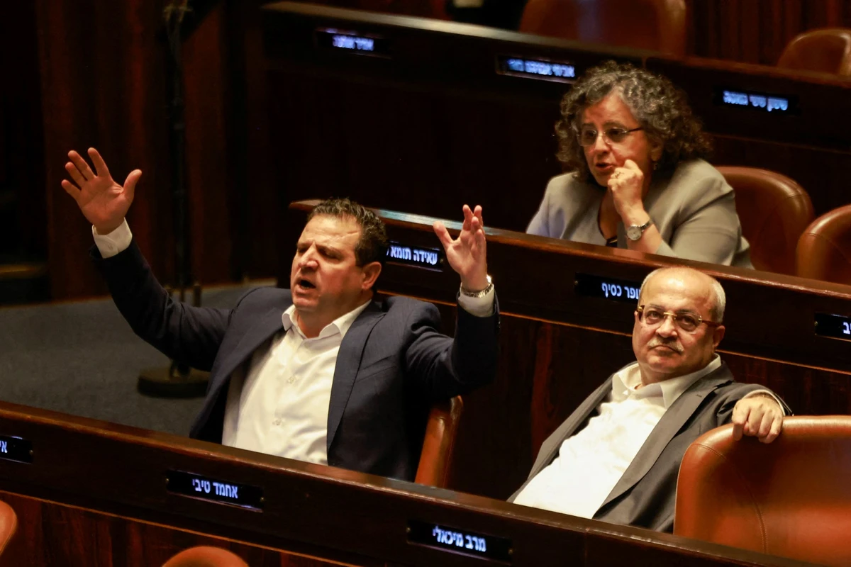 Outside the Knesset, Arab and Jewish Israelis gathered in a protest in support of Odeh, calling for the expulsion process to be halted. (AFP/File)