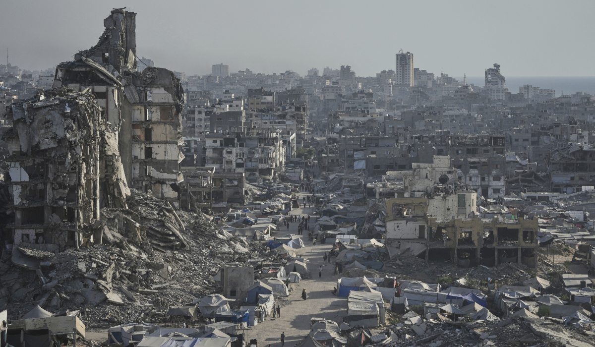 Tents sheltering displaced Palestinians are seen amid war-damaged infrastructure in Gaza City, July 17, 2025. (AP)