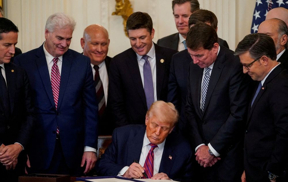 Donald Trump signs the ‘Genius Act’ at the White House in Washington, D.C., US, July 18, 2025. (Reuters)