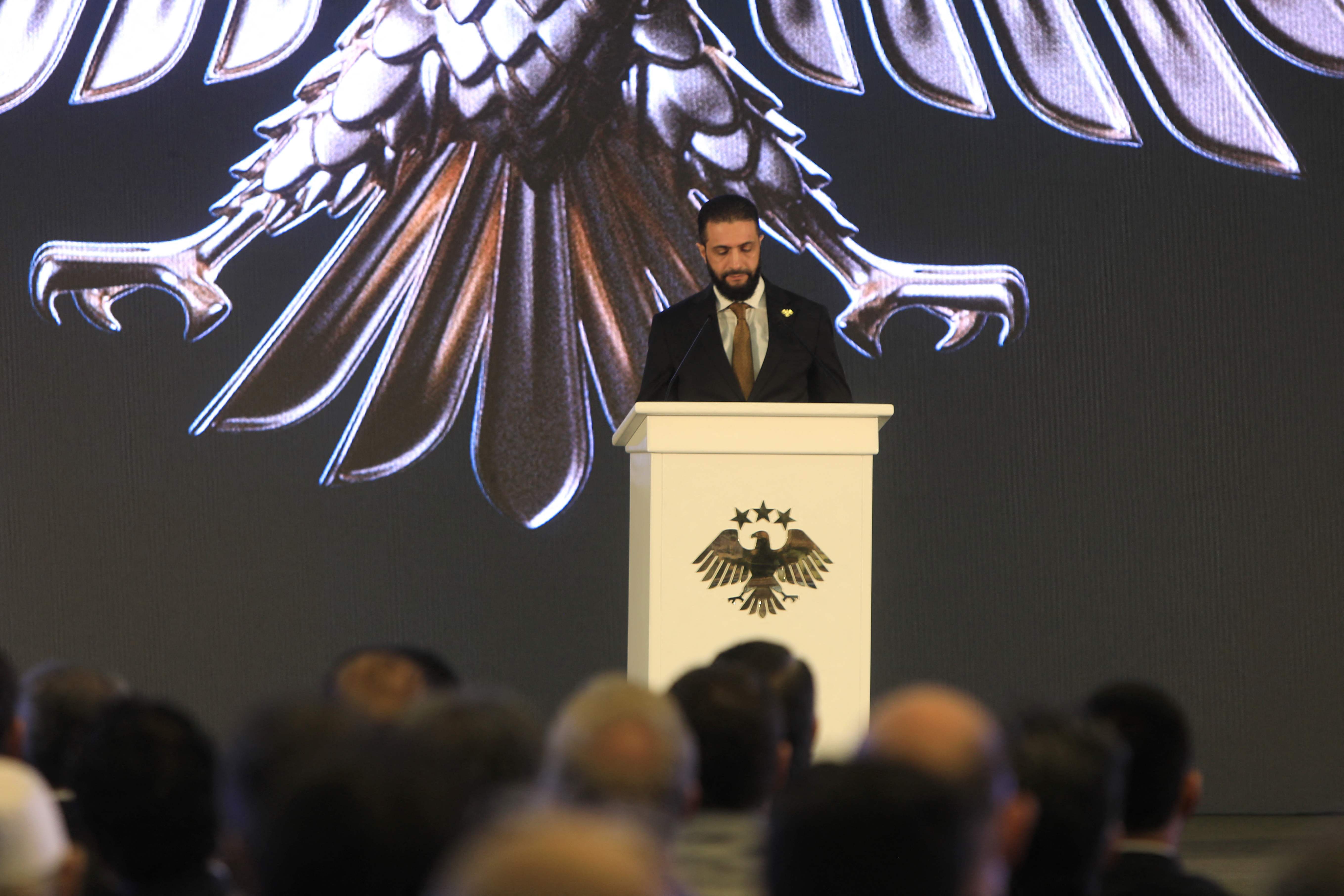 President Ahmad Al-Sharaa delivers a speech during the unveiling of the “New Visual Identity of the Syrian Arab Republic.” (AFP)