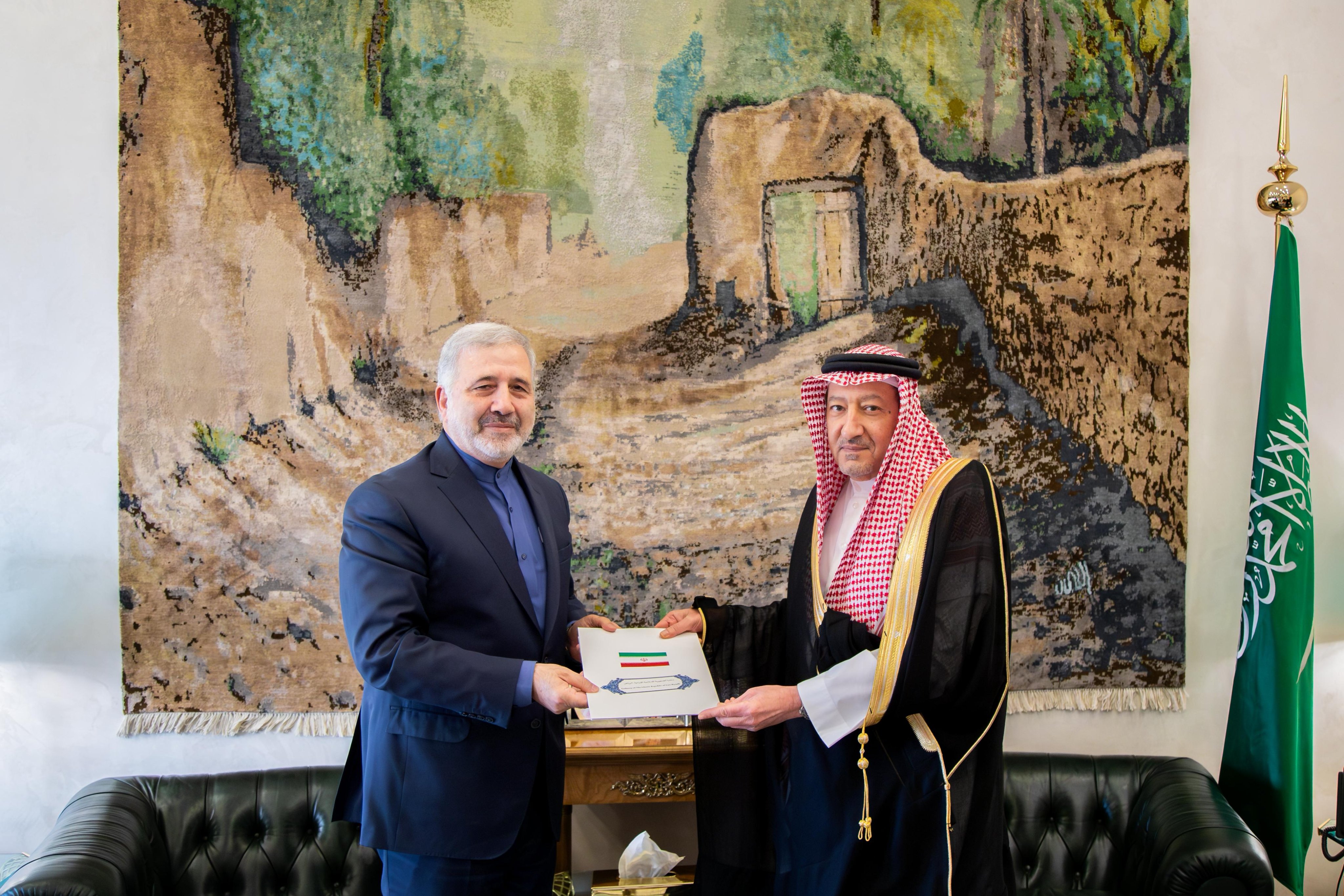 Iran’s ambassador to the Kingdom Alireza Enayati hands over the message to Deputy Minister of Foreign Affairs Waleed bin Abdulkarim Al-Khuraiji in Riyadh. (SPA)