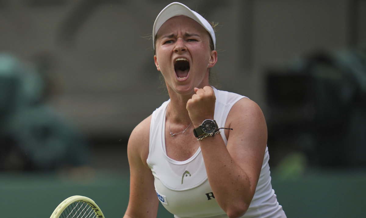 Barbora Krejcikova of Czech Republic celebrates after beating Alexandra Eala of the Philippines in their first round women's singles match at the Wimbledon Tennis Championships in London, Tuesday, July 1, 2025. (AP)