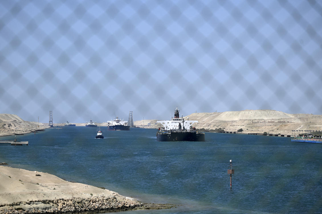 Ships sail along Egypt's Suez Canal near Ismailia on April 16, 2025. (Photo by Khaled DESOUKI / AFP)