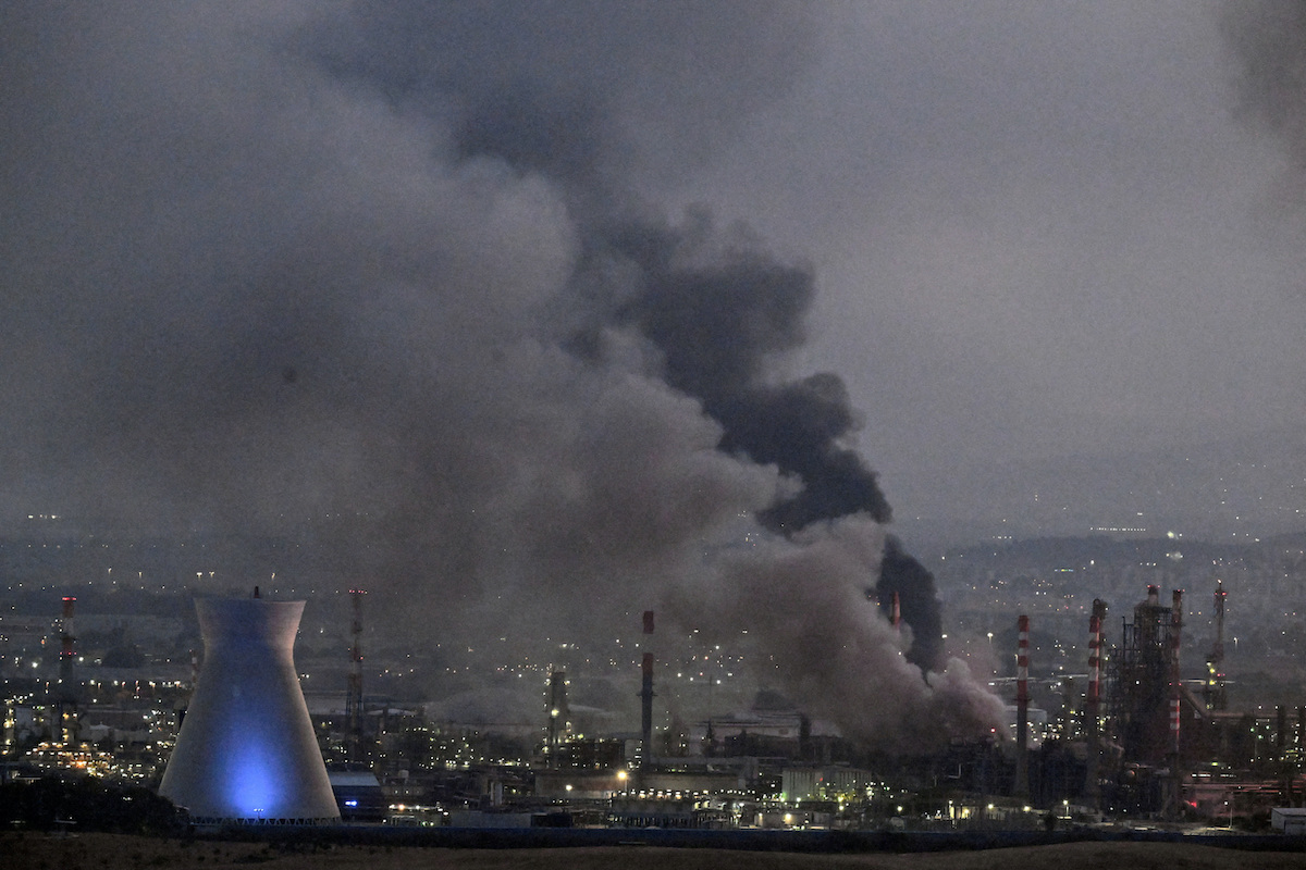 Smoke rises from a site in Haifa, Israel, after a missile attack by Iran during their 12-day war last month. (Reuters)
