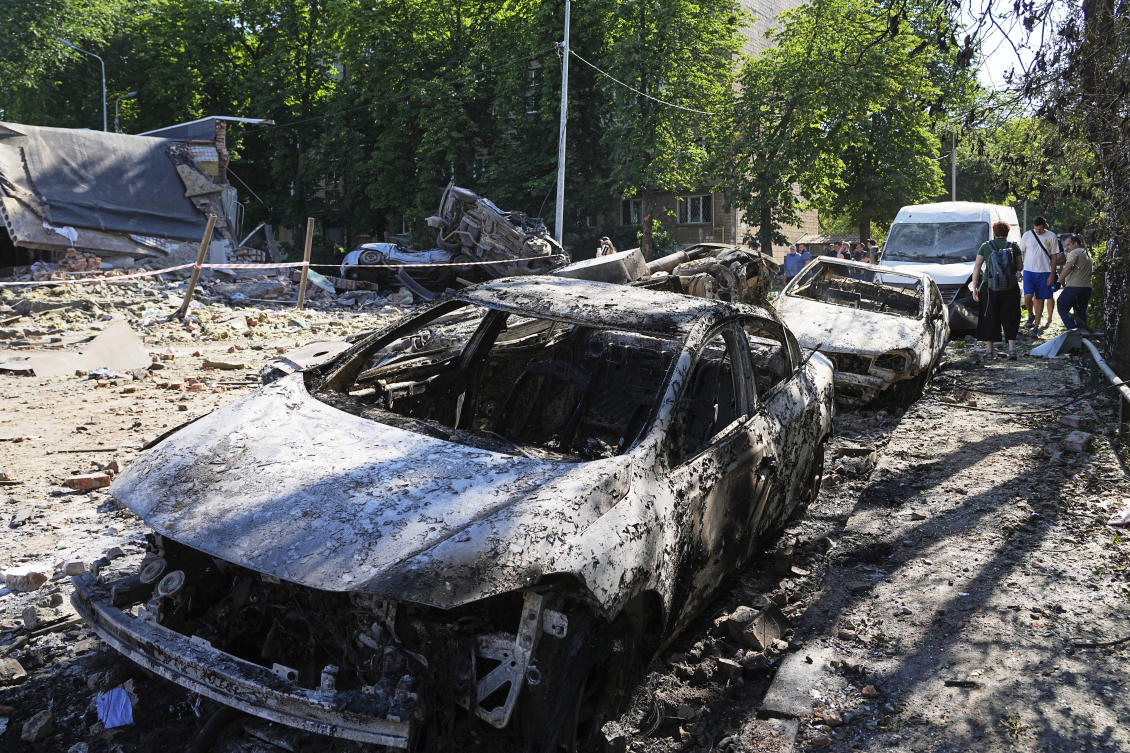 Damaged cars lie in a yard among other debris after a Russian drone and missile attacks in Kyiv, July 4, 2025. (AP)