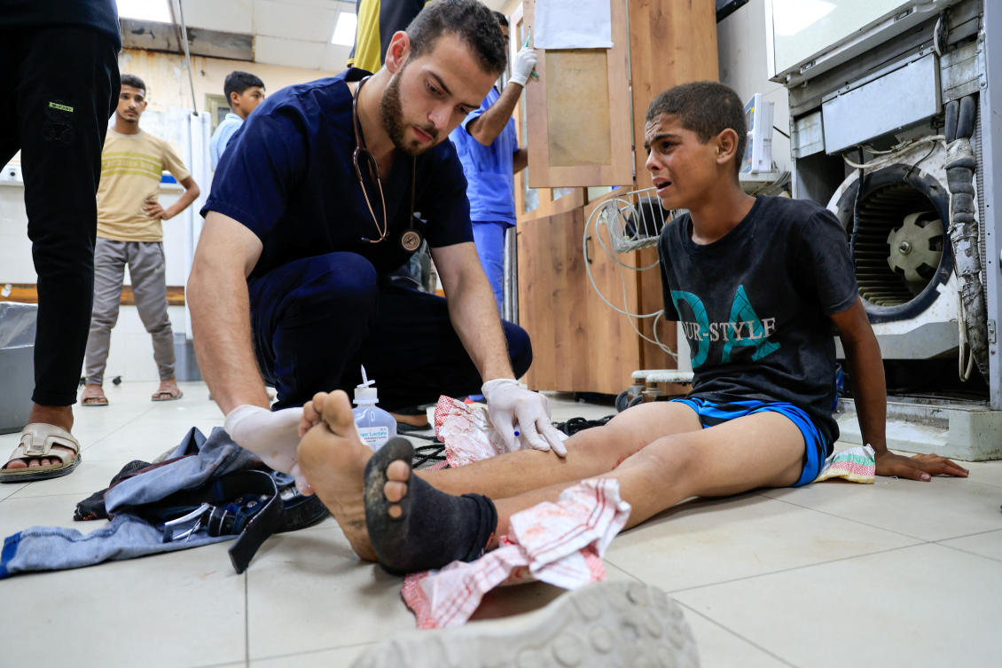 A Palestinian, wounded by Israeli fire while seeking aid on Friday, receives treatment at Nasser Hospital in Khan Younis, southern Gaza Strip, July 4 2025. (Reuters)