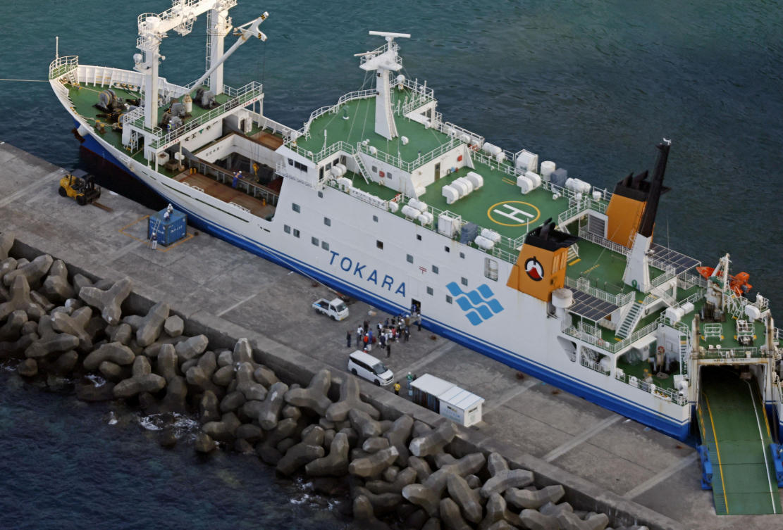 Residents and visitors board a ferry to evacuate from Akuseki Island on July 4, 2025. (Kyodo via Reuters)