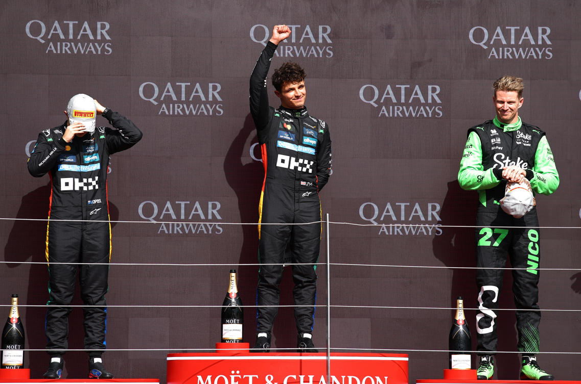 McLaren’s Lando Norris celebrates on the podium after winning the British Grand Prix alongside second placed McLaren’s Oscar Piastri and third placed Sauber’s Nico Hulkenberg. (Reuters)