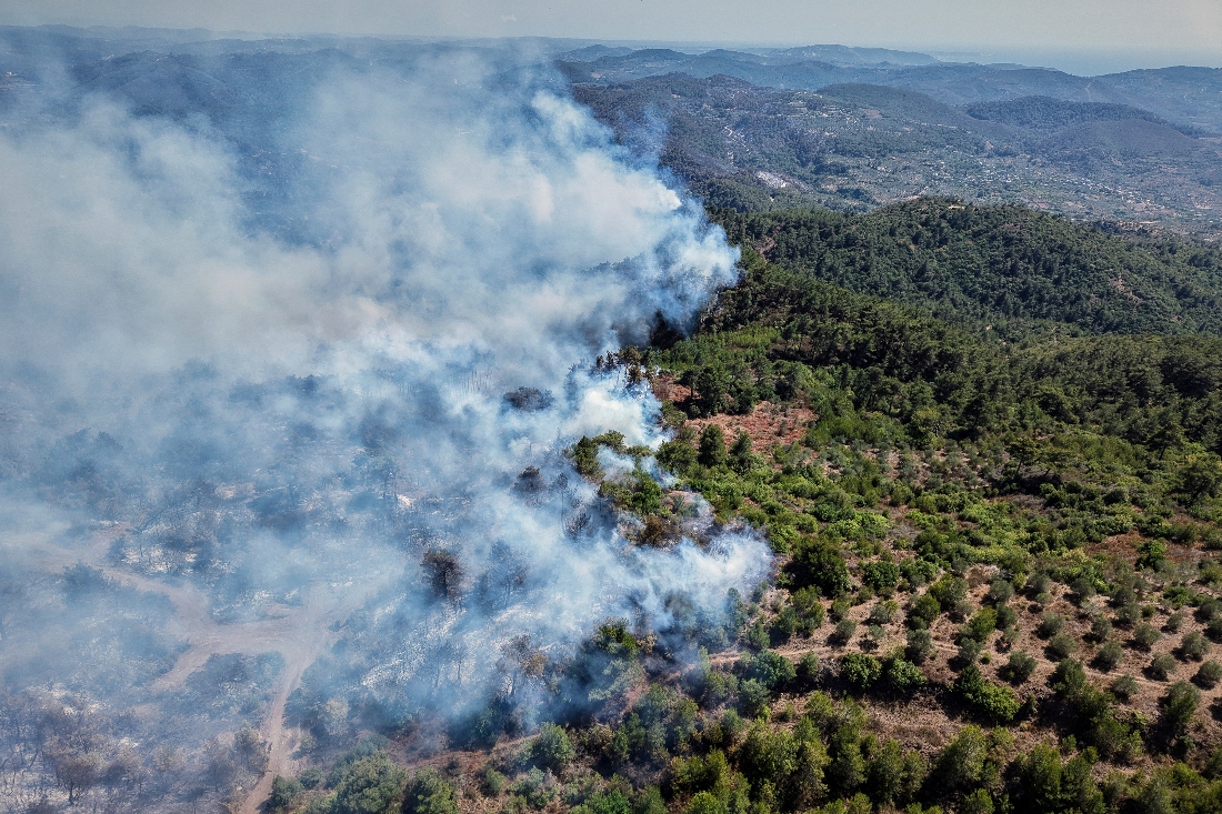 Smoke rises as fires continue to rage in Latakia, Syria. (AP)