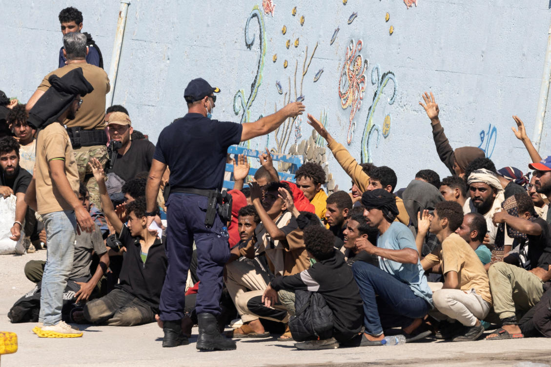 Greek officials assist migrants in Agia Galini, Crete, Greece, July 6, 2025. (Reuters)
