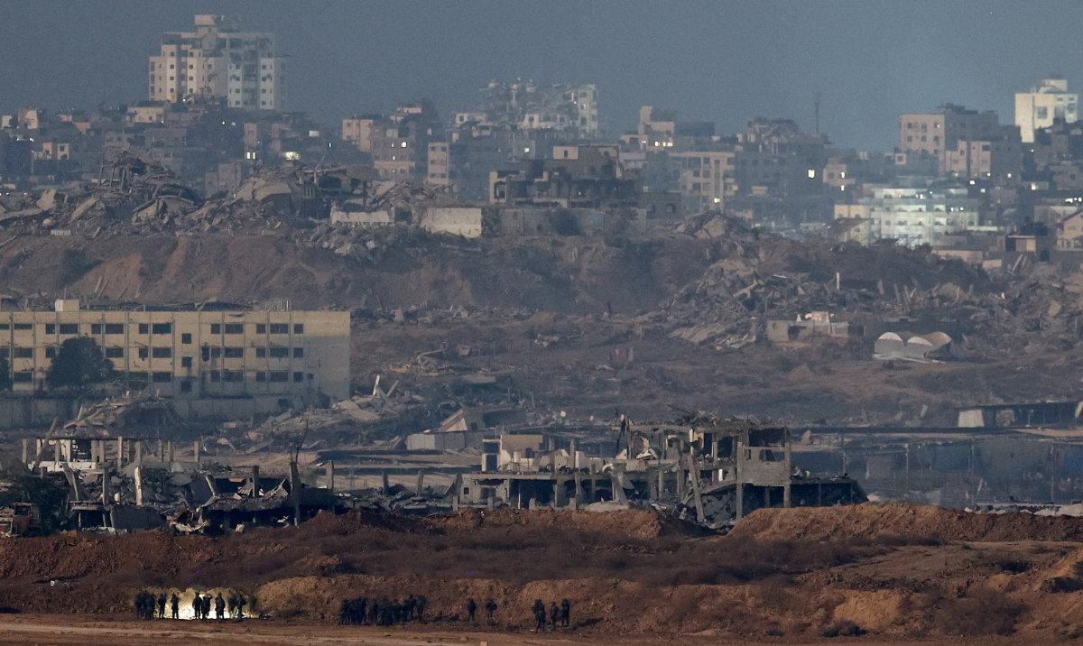 Israeli soldiers operate in Gaza, as seen from the Israeli side of the Israel-Gaza border, July 9, 2025. (Reuters)