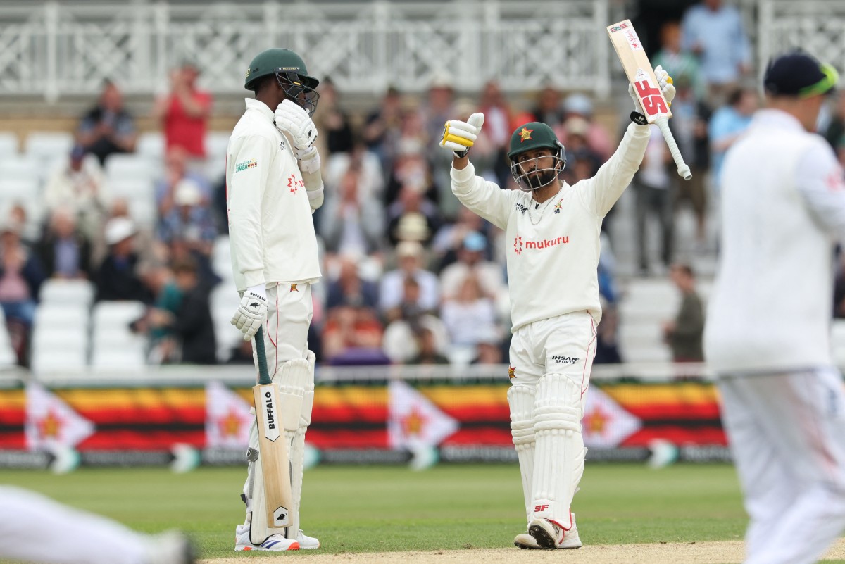 Zimbabwe's Sikandar Raza reacts to reaching his half century during the recent one-off Test match against England. (AFP)